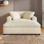 Sillón tapizado grande color beige, tela de felpa, con capacidad para 1 o 2 personas.