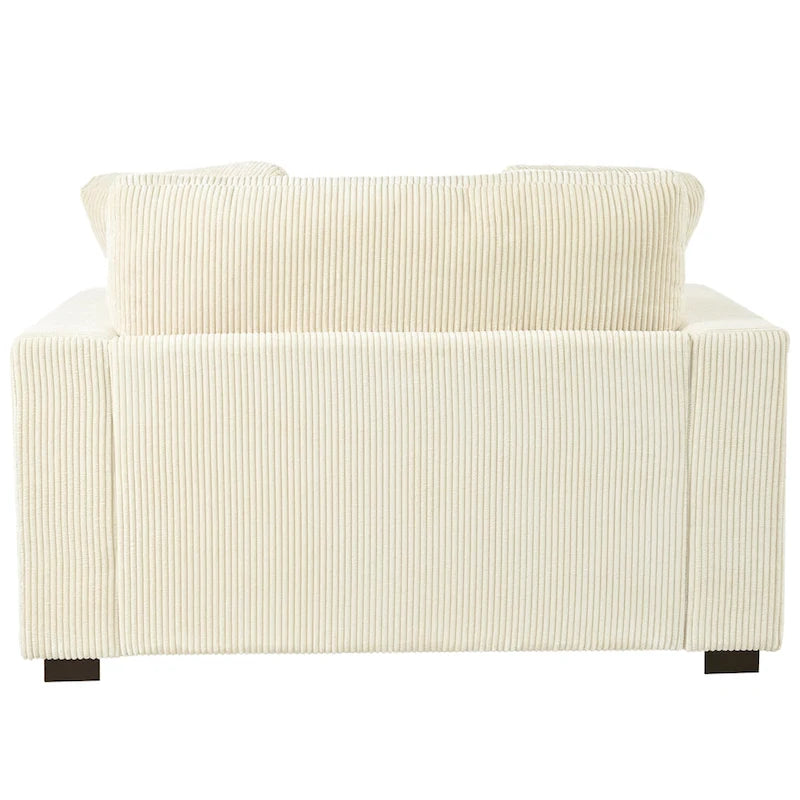 Sillón tapizado grande color beige, tela de felpa, con capacidad para 1 o 2 personas.