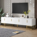 Mueble de TV blanco y dorado, 4 puertas con patrón geométrico, apto para televisores de hasta 80"
