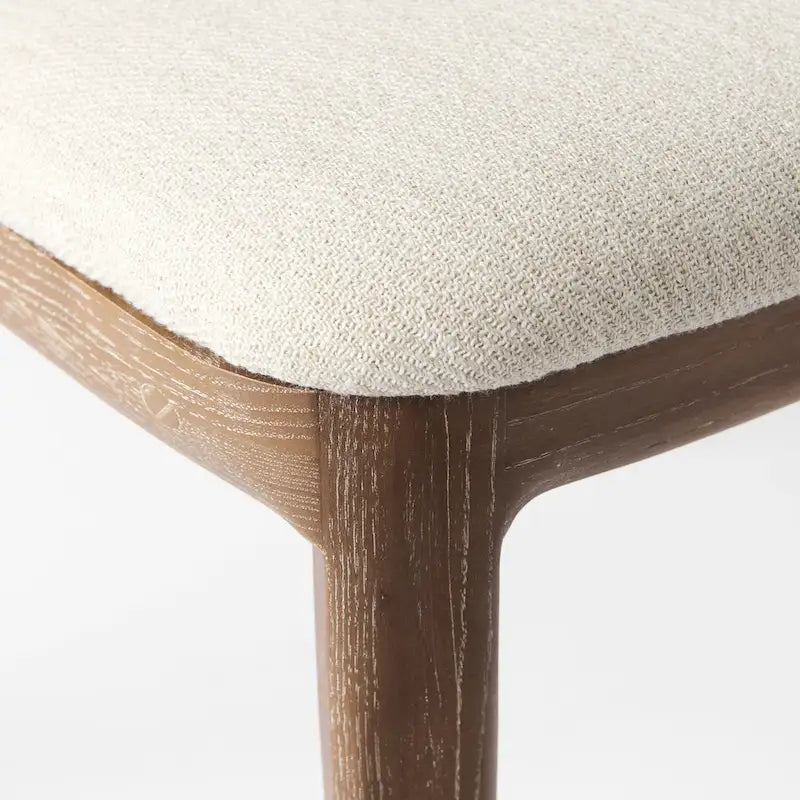 Silla de comedor sin brazos Clara con asiento crema y madera marrón claro